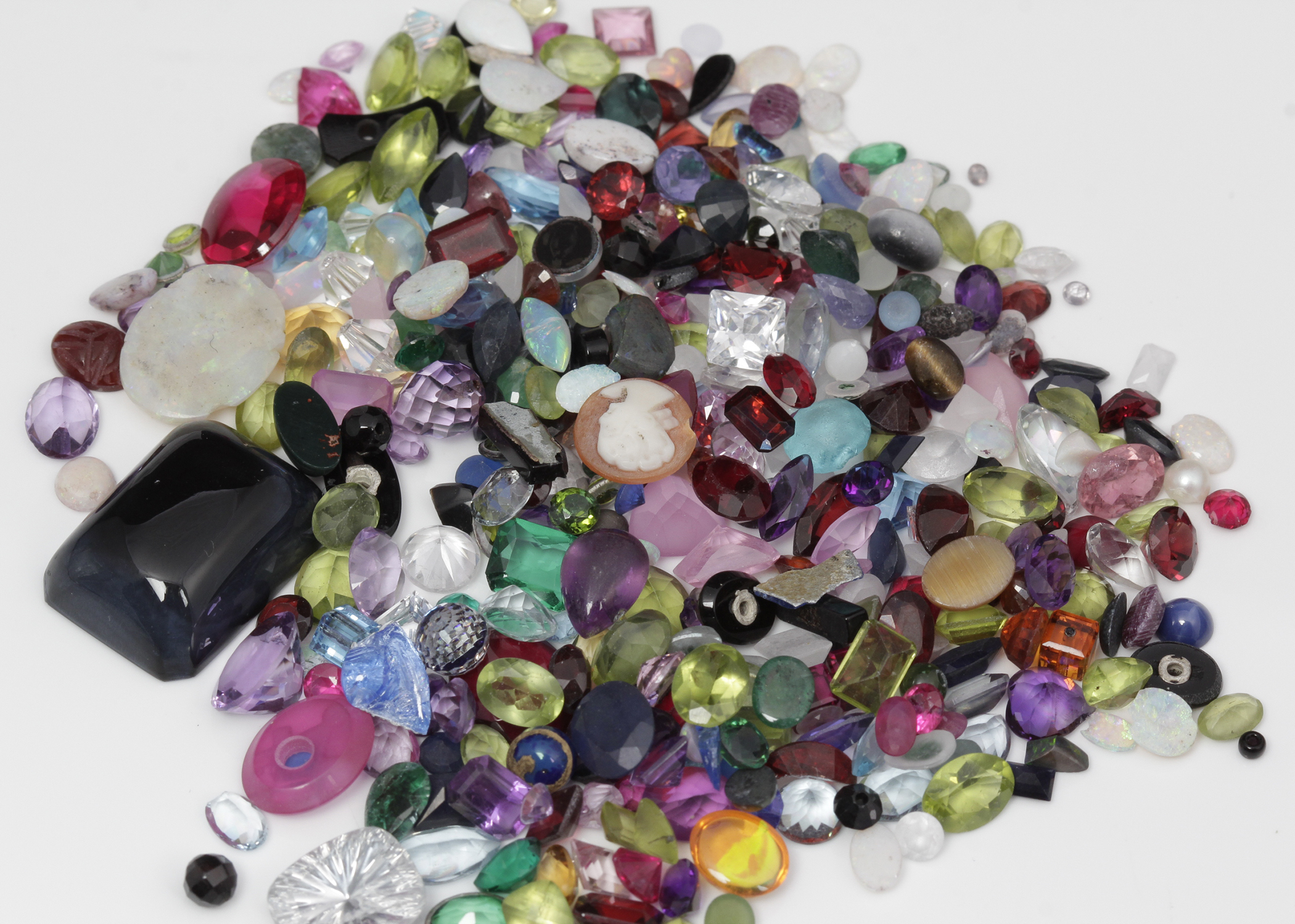 310 CTS of Genuine, Synthetic, and Simulated Stones