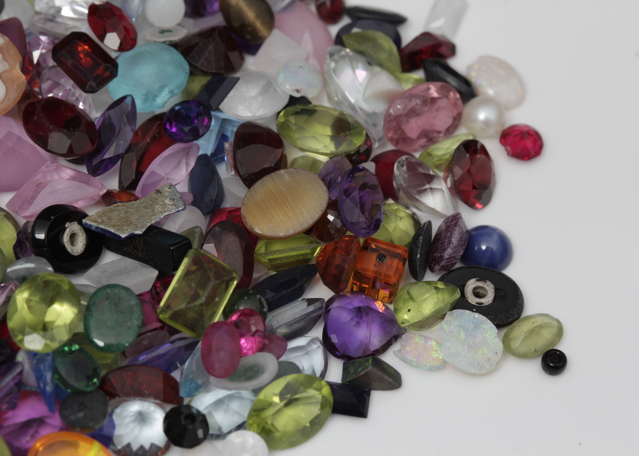 310 CTS of Genuine, Synthetic, and Simulated Stones