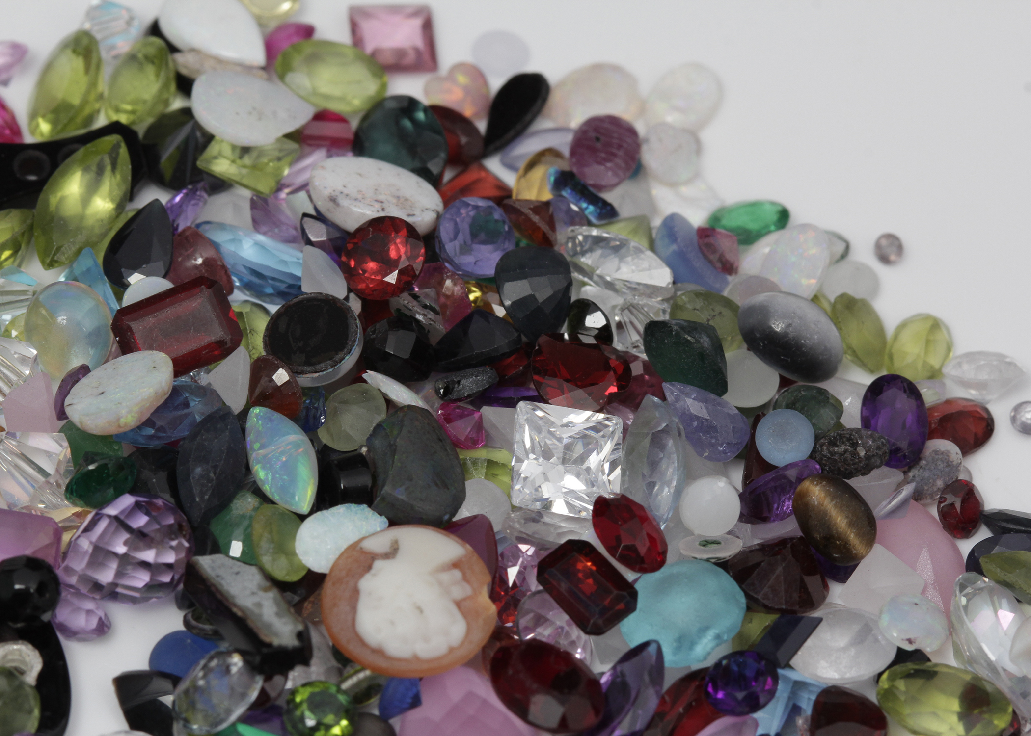 310 CTS of Genuine, Synthetic, and Simulated Stones