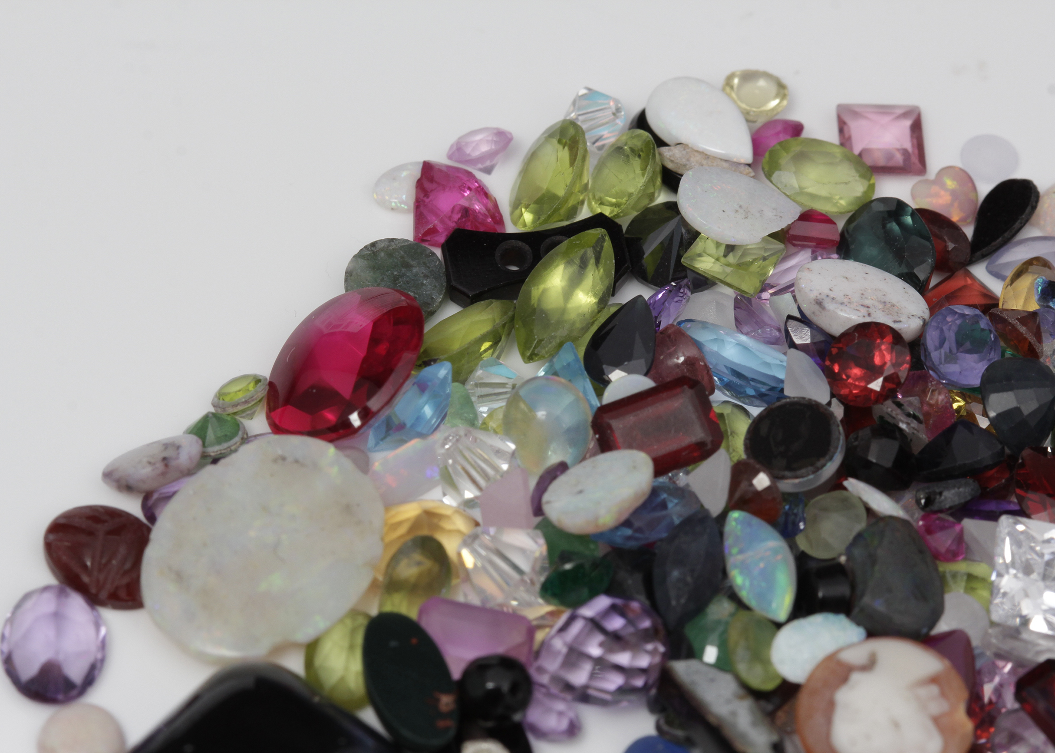 310 CTS of Genuine, Synthetic, and Simulated Stones