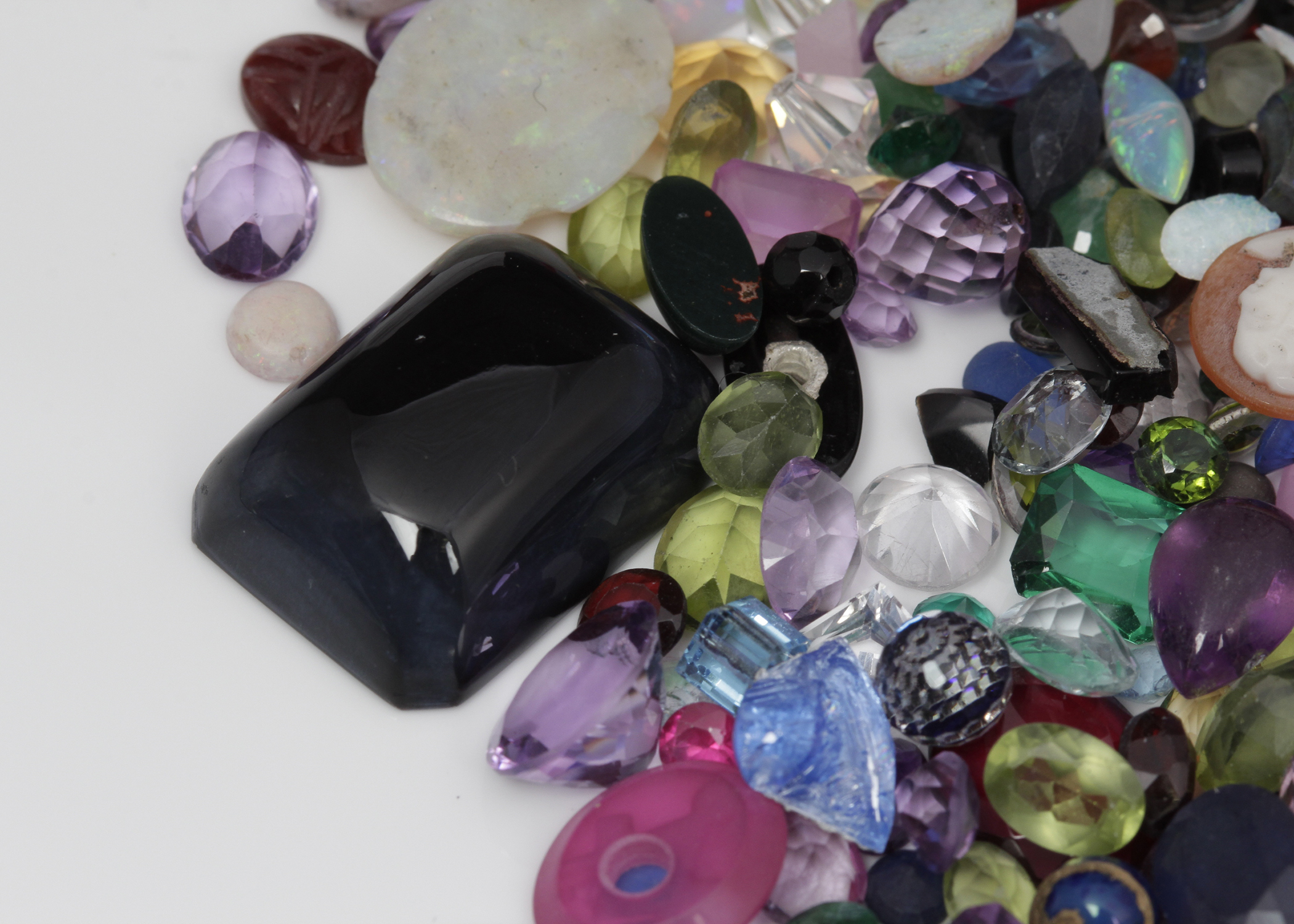 310 CTS of Genuine, Synthetic, and Simulated Stones