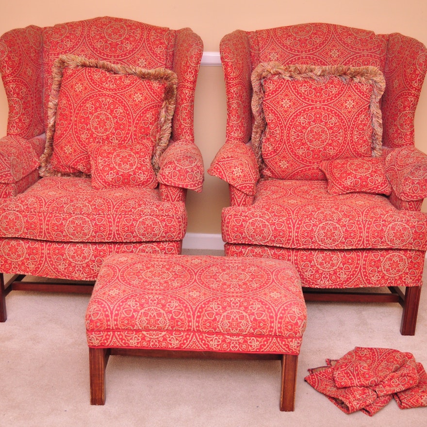 Pair of Upholstered Wingback Chairs and Matching Ottoman