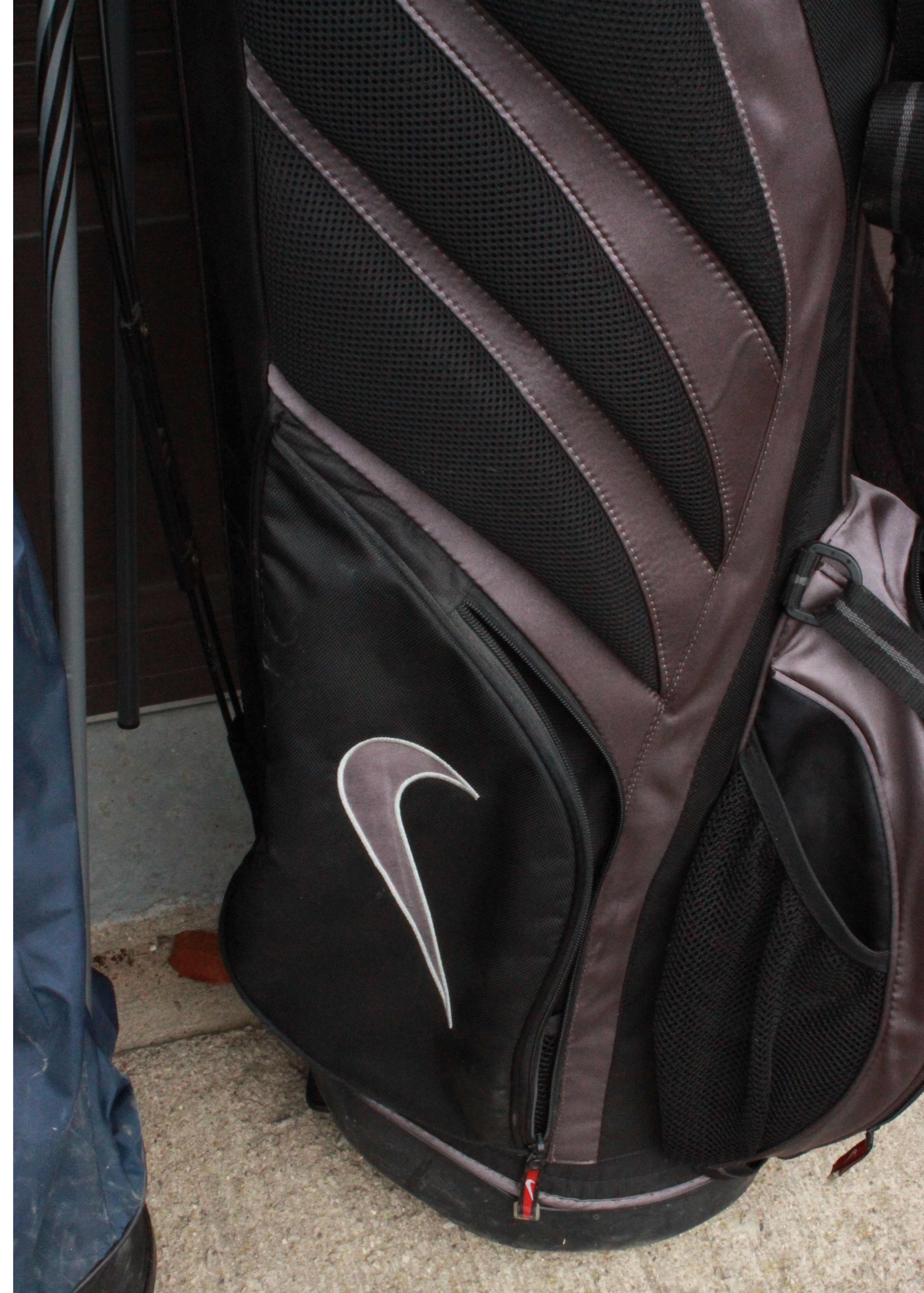 Collection of Assorted Golf Clubs and Bags