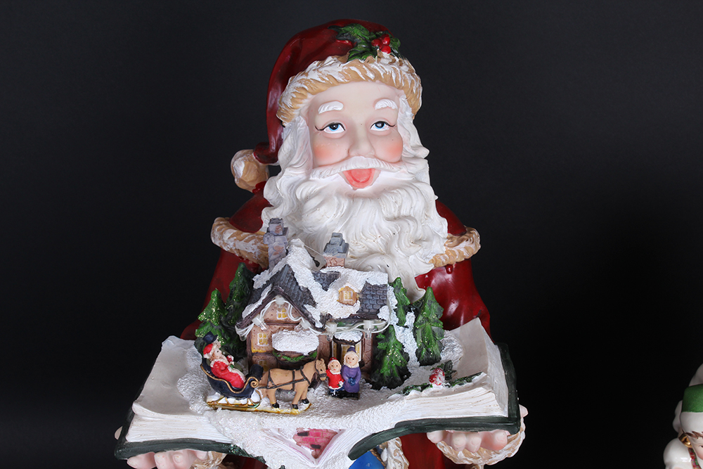 Pair of Christmas Santa's