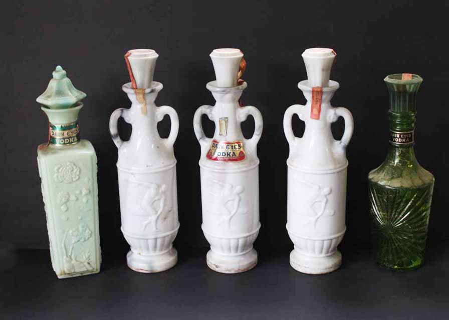 Collection of Vintage Dark Eyes Vodka Decanters