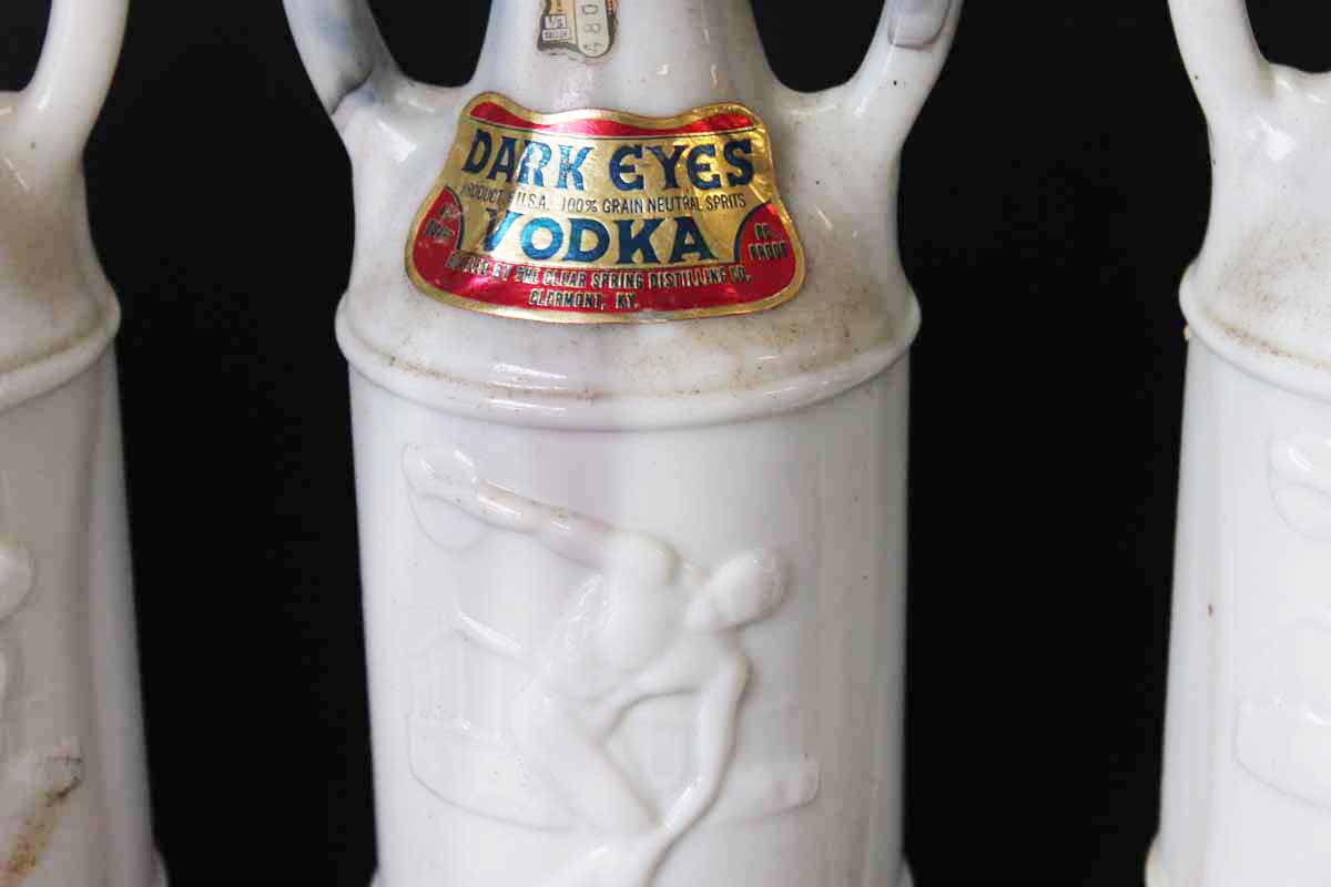 Collection of Vintage Dark Eyes Vodka Decanters