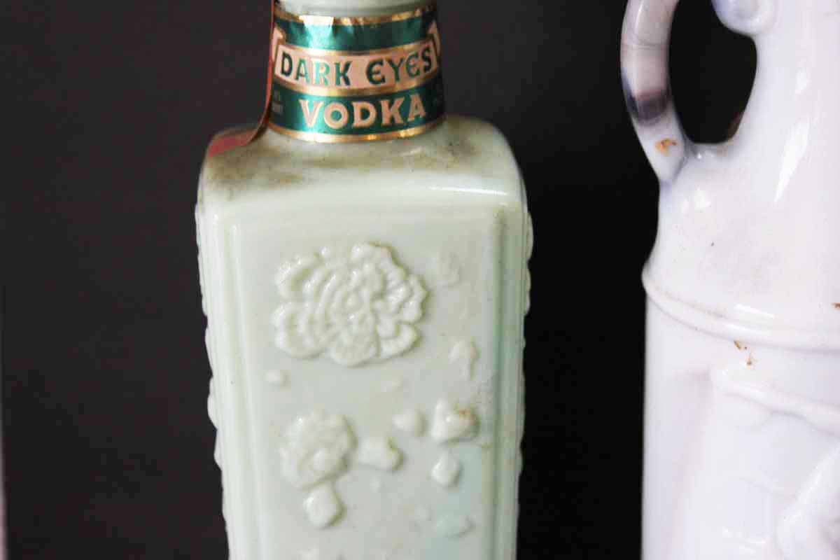 Collection of Vintage Dark Eyes Vodka Decanters