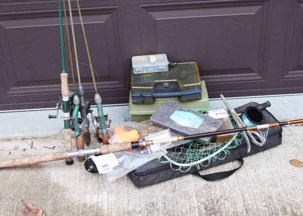 Assortment of Fishing Poles and Tackle