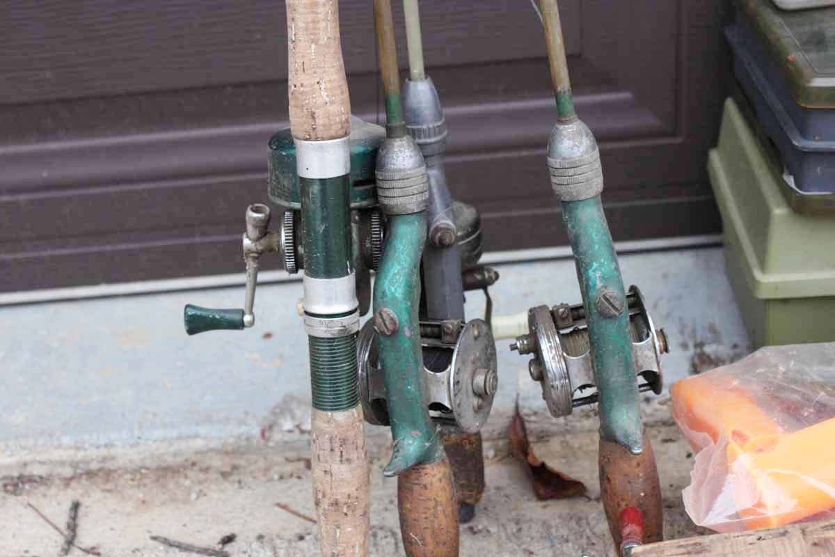 Assortment of Fishing Poles and Tackle