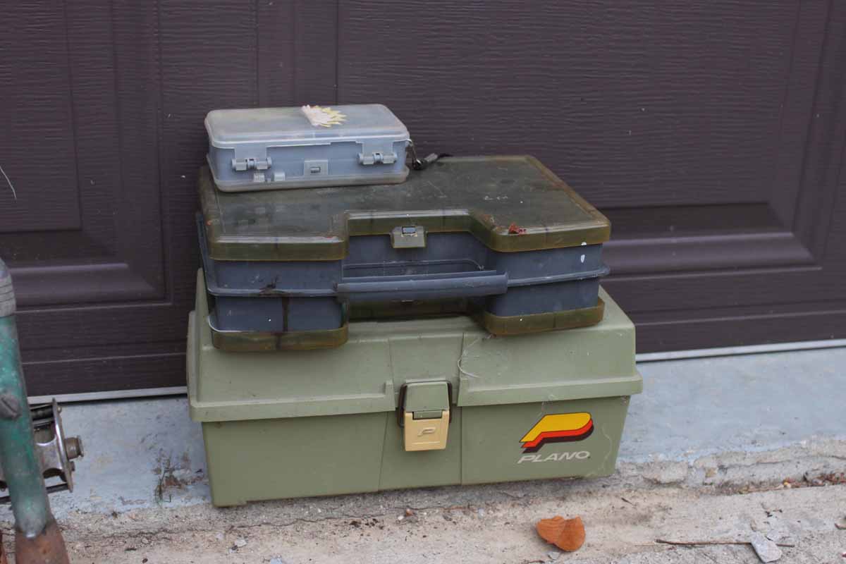 Assortment of Fishing Poles and Tackle