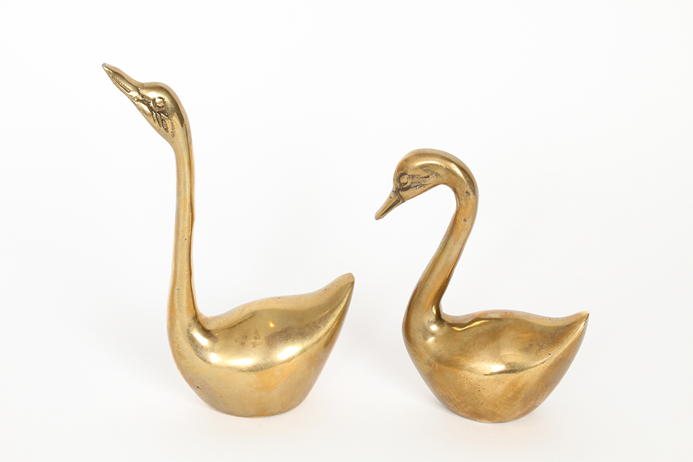 Flock of Decorative Brass Swans