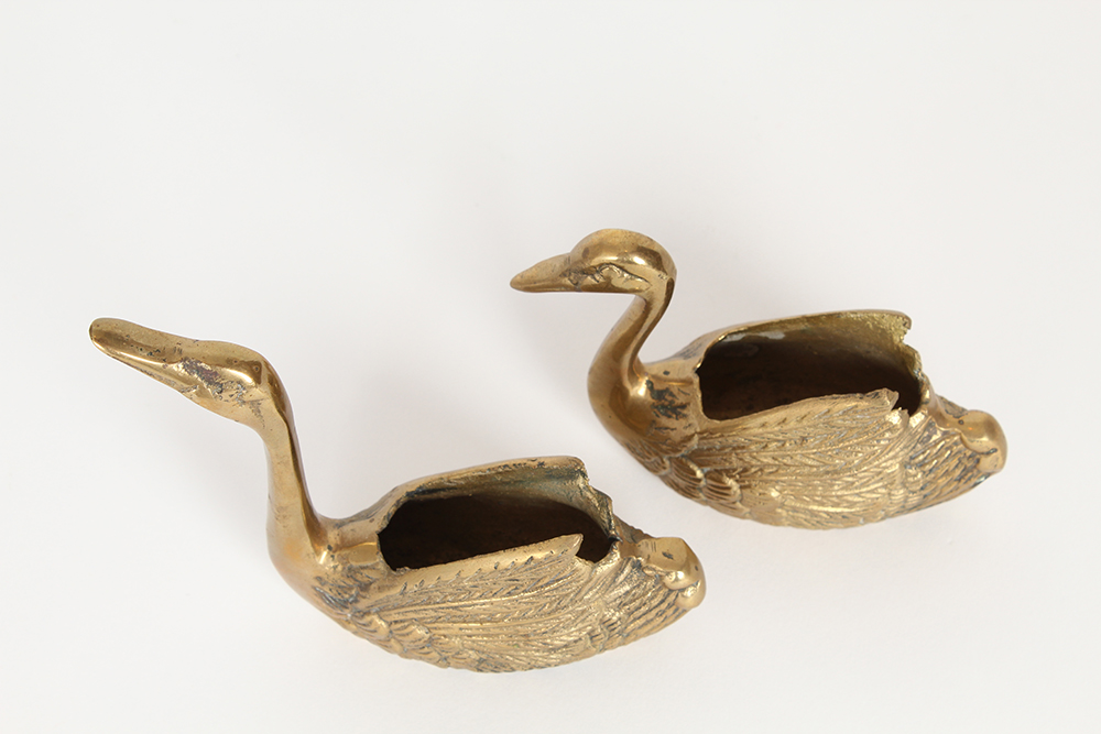 Flock of Decorative Brass Swans