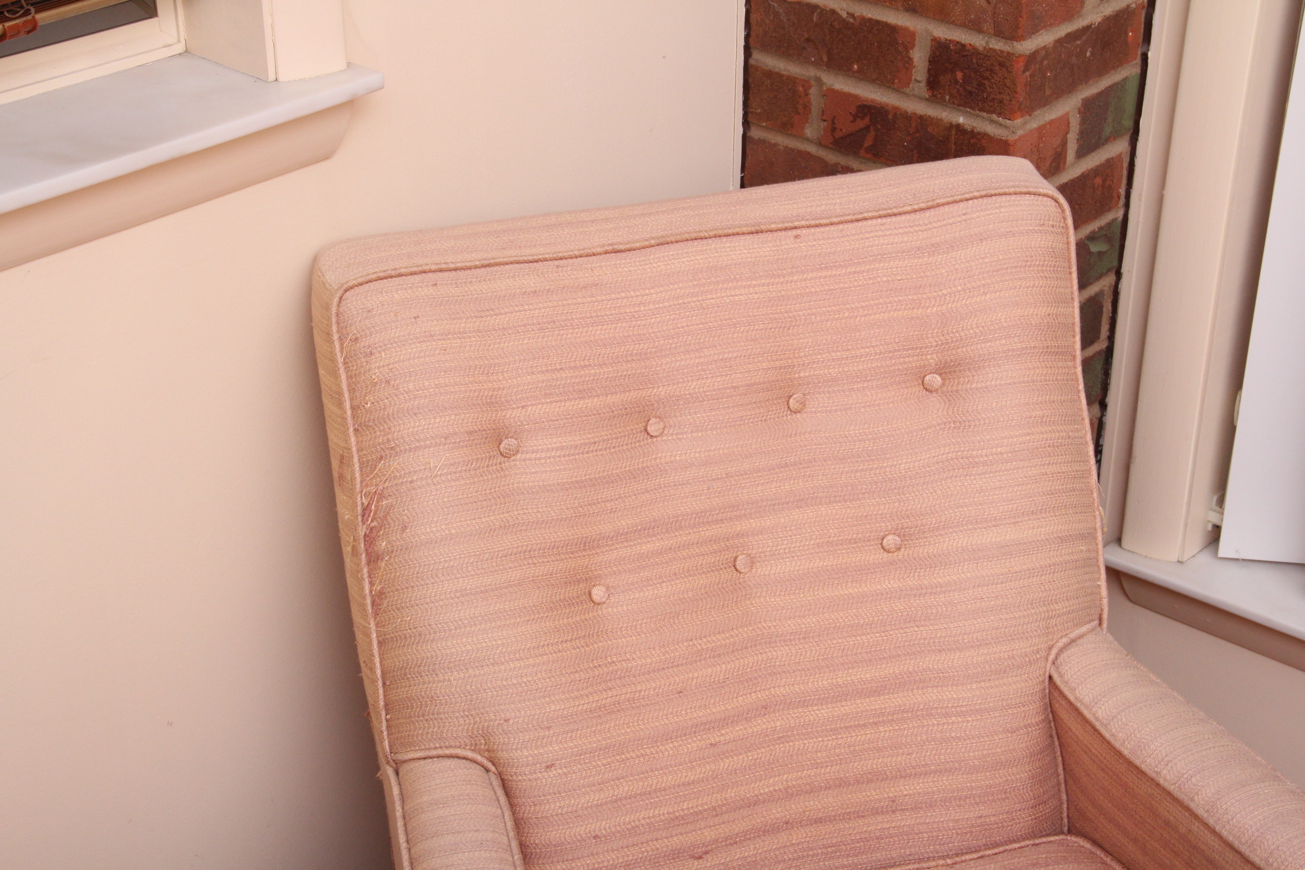 Dusty Rose Upholstered Armchair and Ottoman