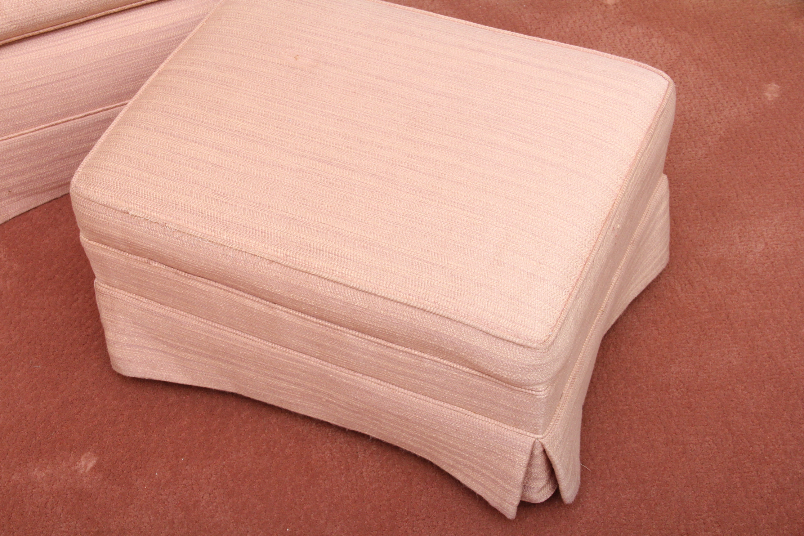 Dusty Rose Upholstered Armchair and Ottoman