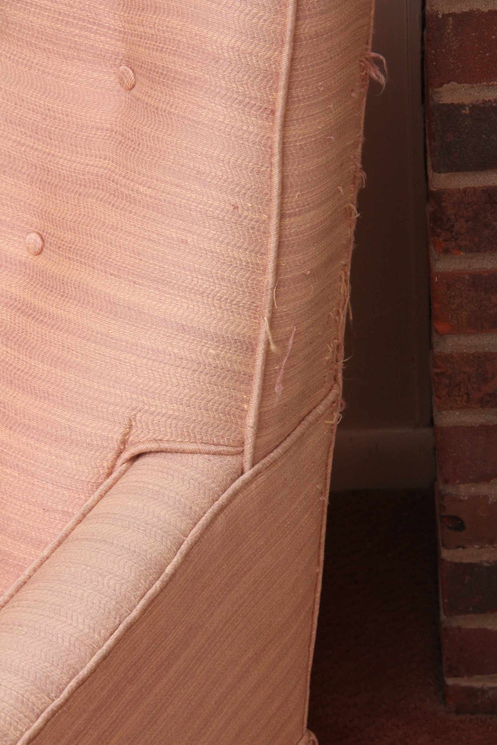 Dusty Rose Upholstered Armchair and Ottoman