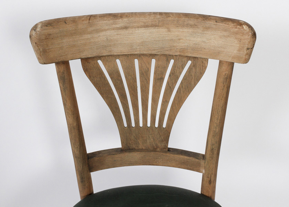 Pair of Leather Chairs with Ribbed Backs