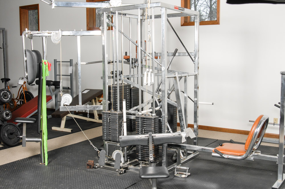 Universal multi station outlet weight machine