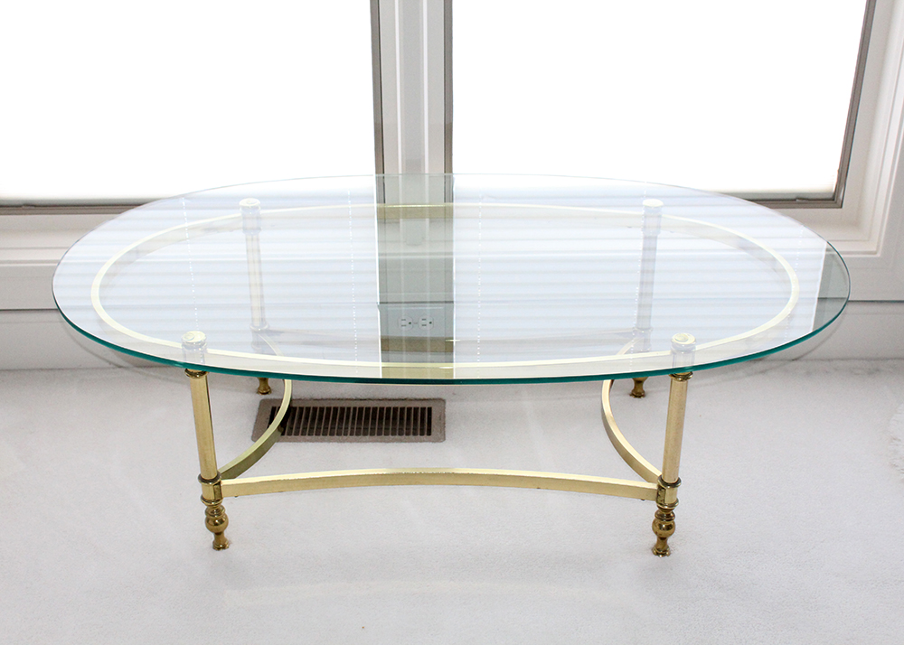Oval Brass Bottom Glass Topped Coffee Table