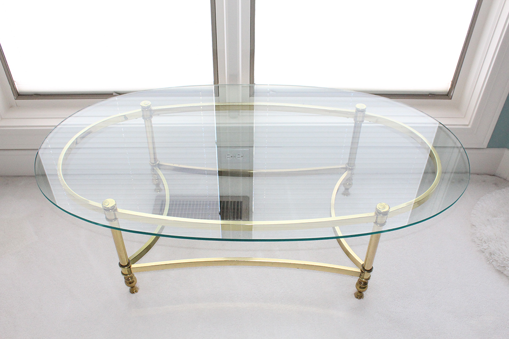 Oval Brass Bottom Glass Topped Coffee Table