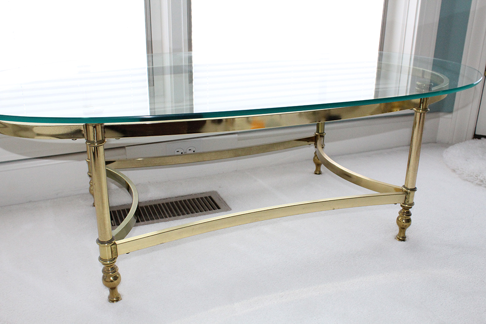 Oval Brass Bottom Glass Topped Coffee Table