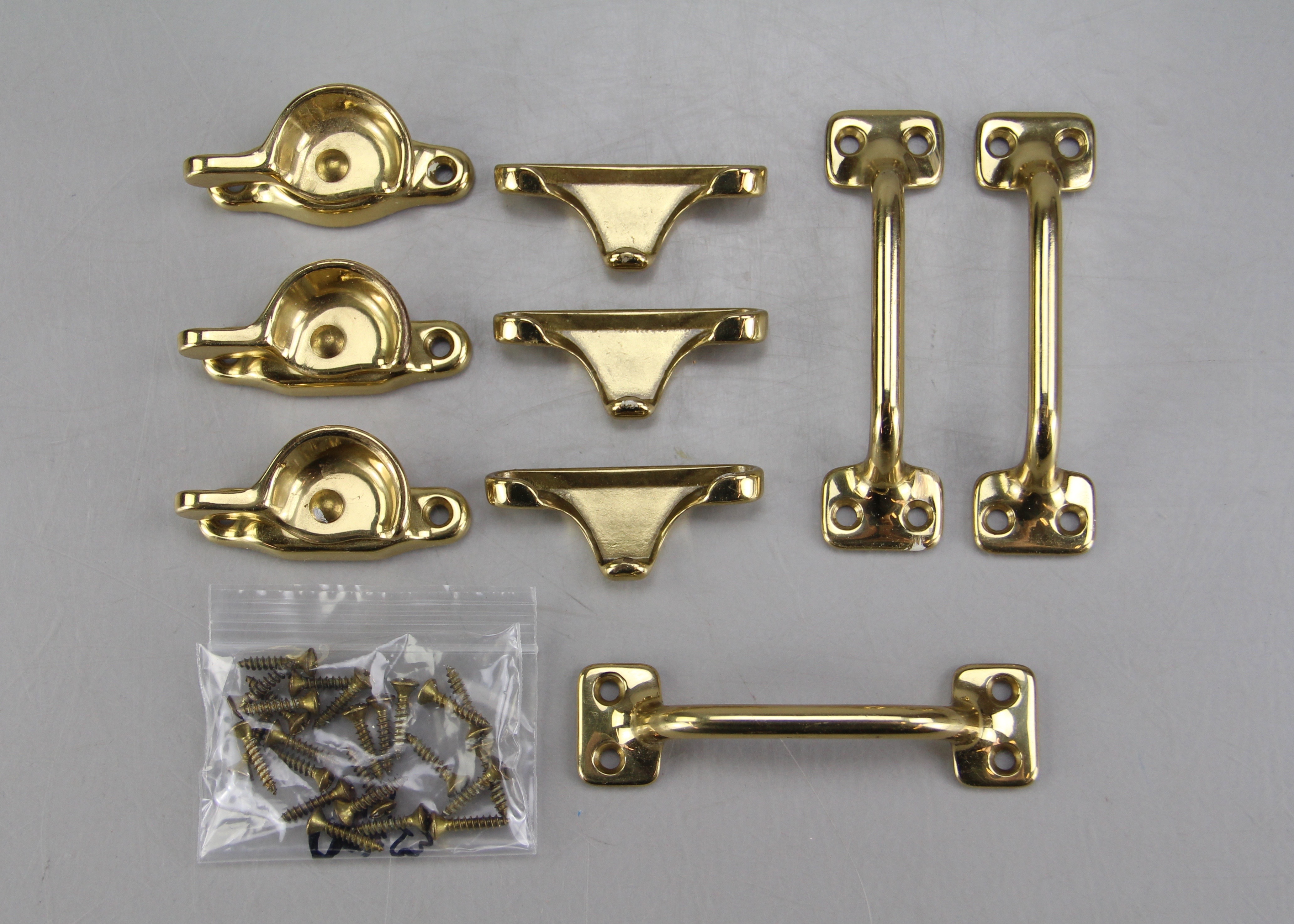 Trio of Polished Brass Lock and Handle Sets