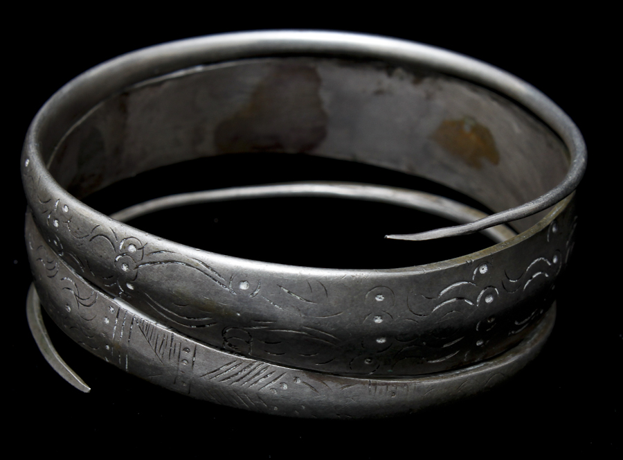 Pair of Silver-Toned Jewelry Pieces