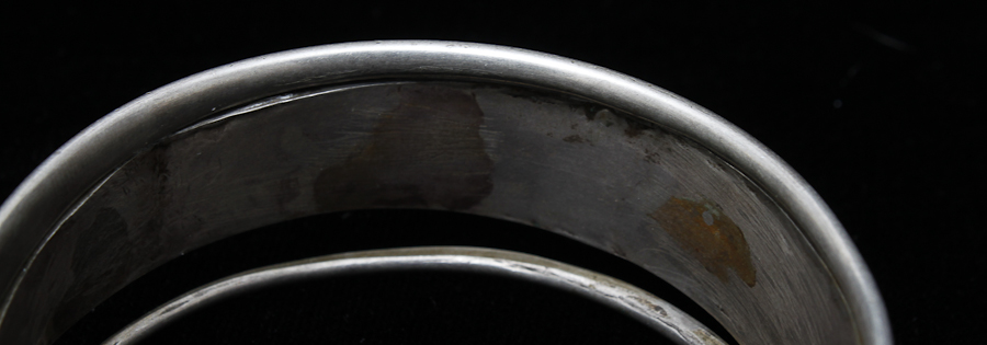 Pair of Silver-Toned Jewelry Pieces