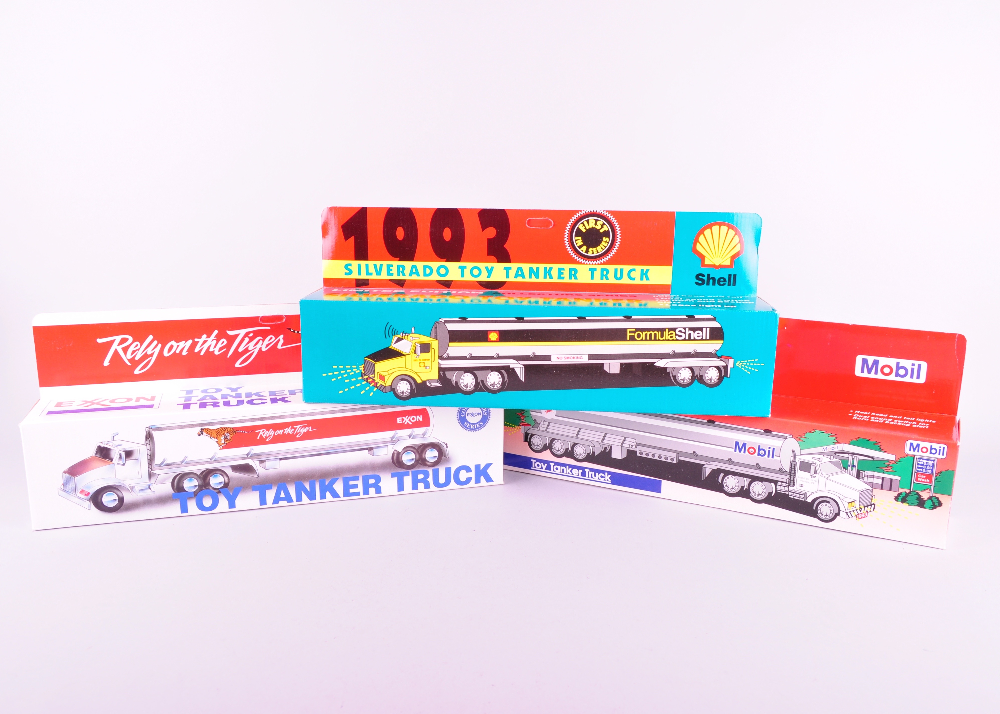 Trio of Toy Tanker Trucks