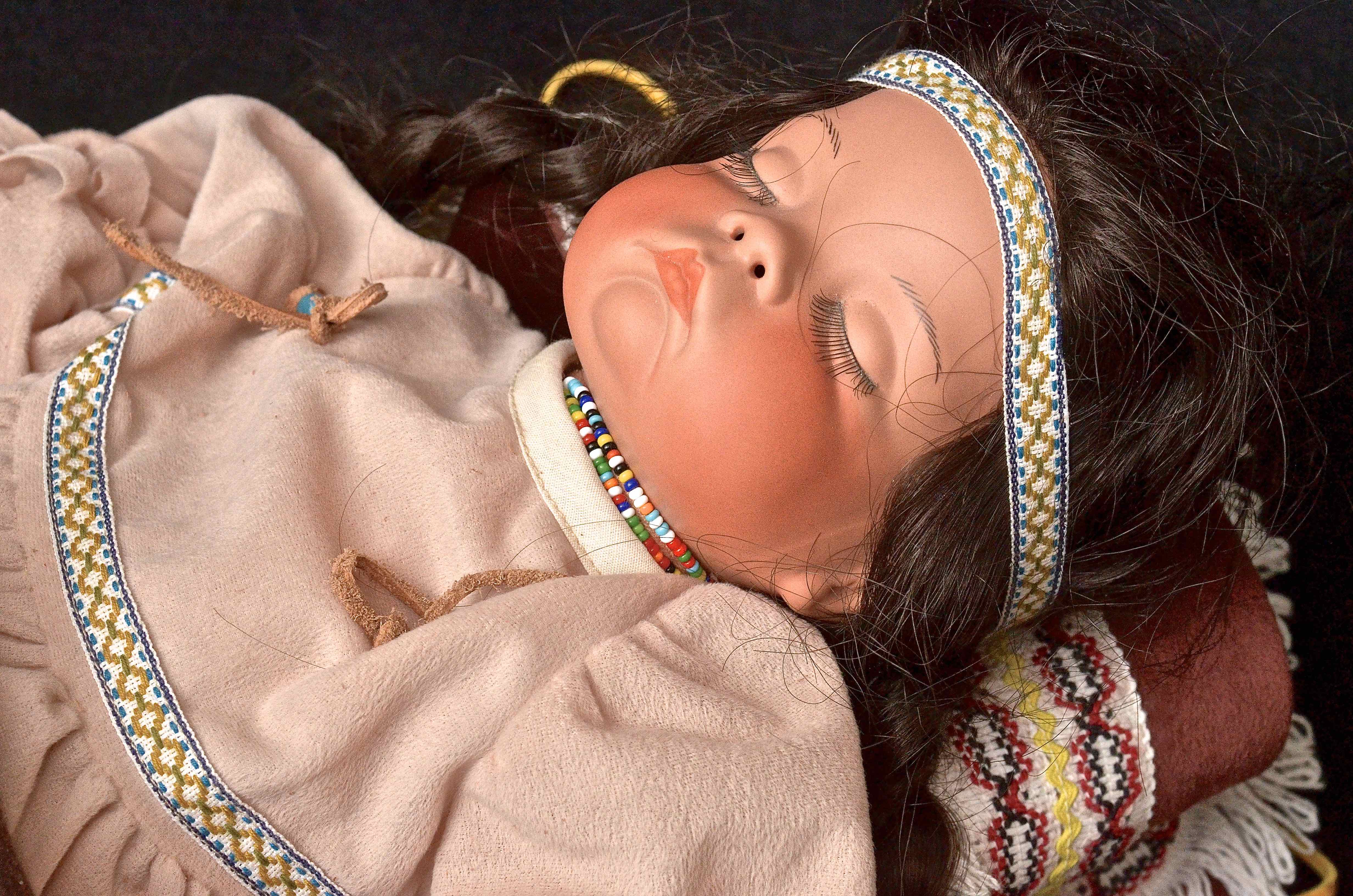 Porcelain Native American Doll Sleeping In Cradleboard