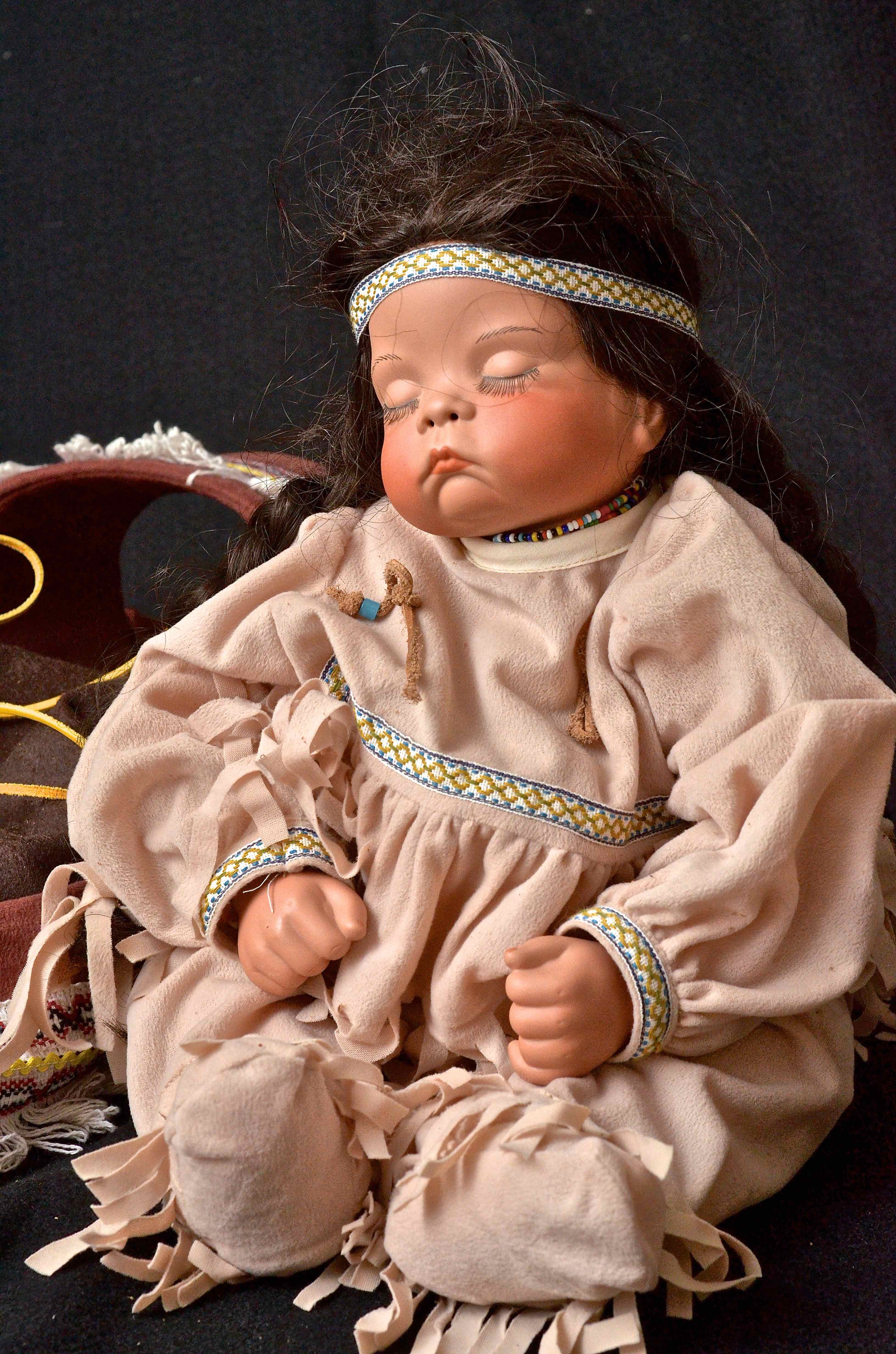 Porcelain Native American Doll Sleeping In Cradleboard