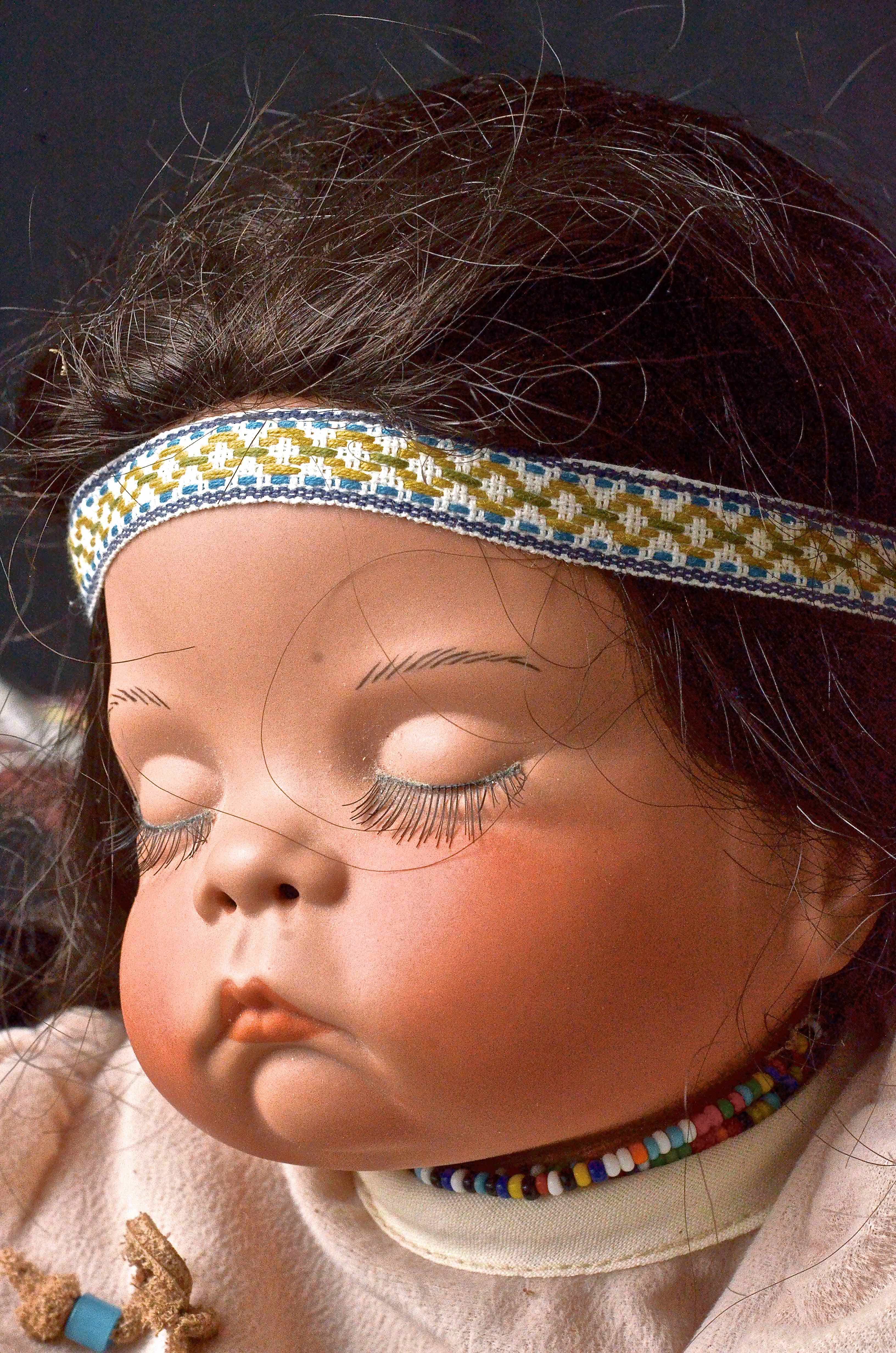 Porcelain Native American Doll Sleeping In Cradleboard