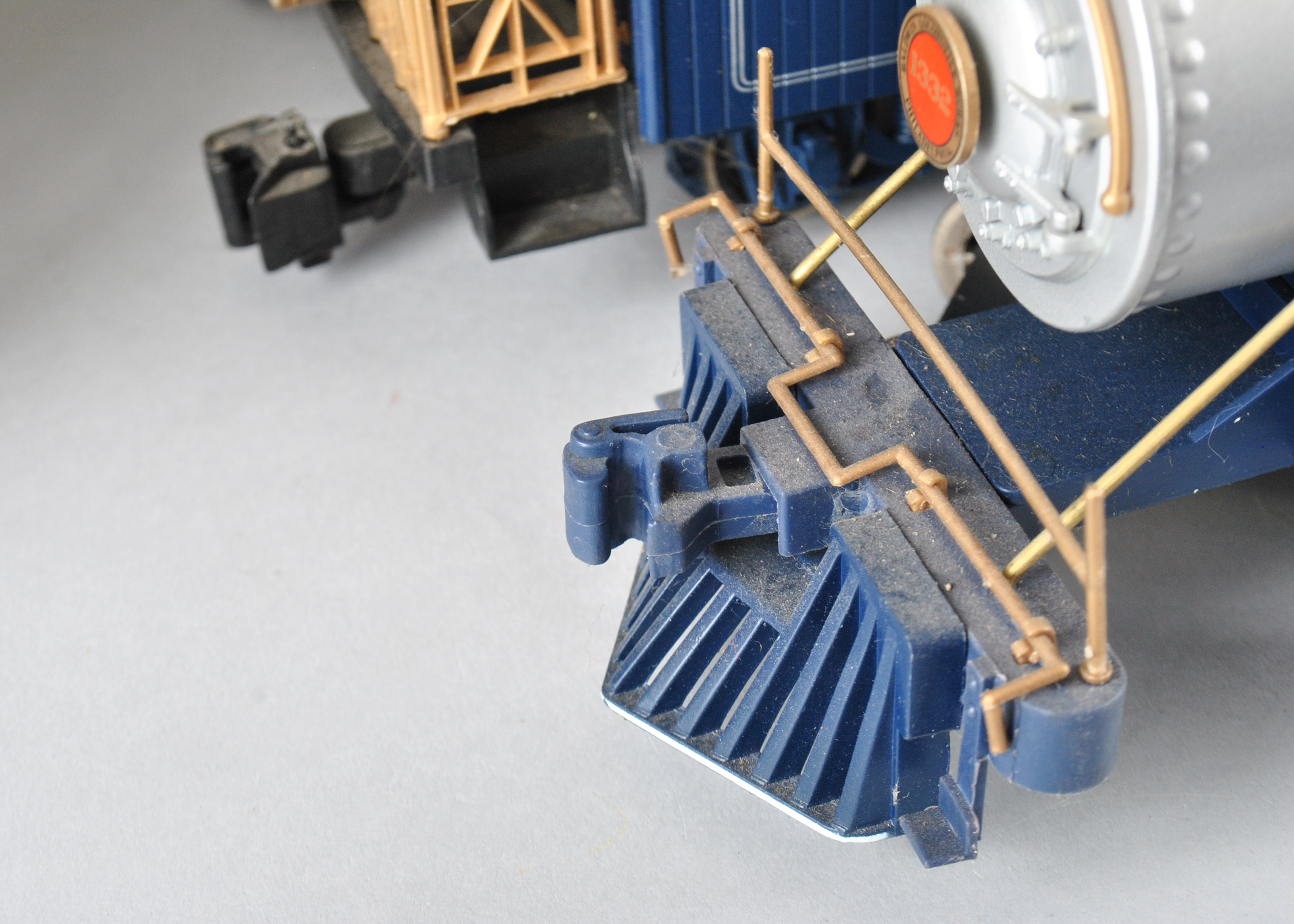 Assortment Of G-Scale Freight Cars, Tracks, And Accessories