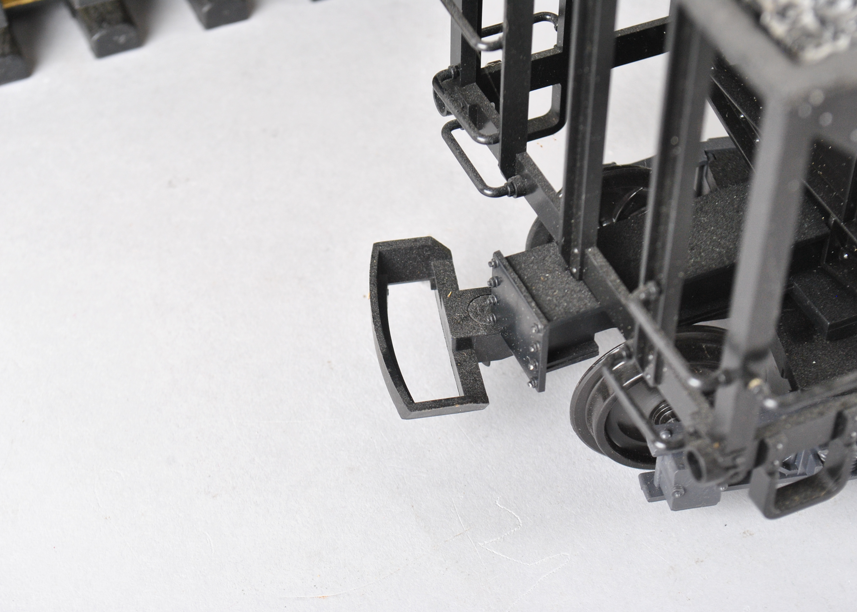 Assortment Of G-Scale Freight Cars, Tracks, And Accessories