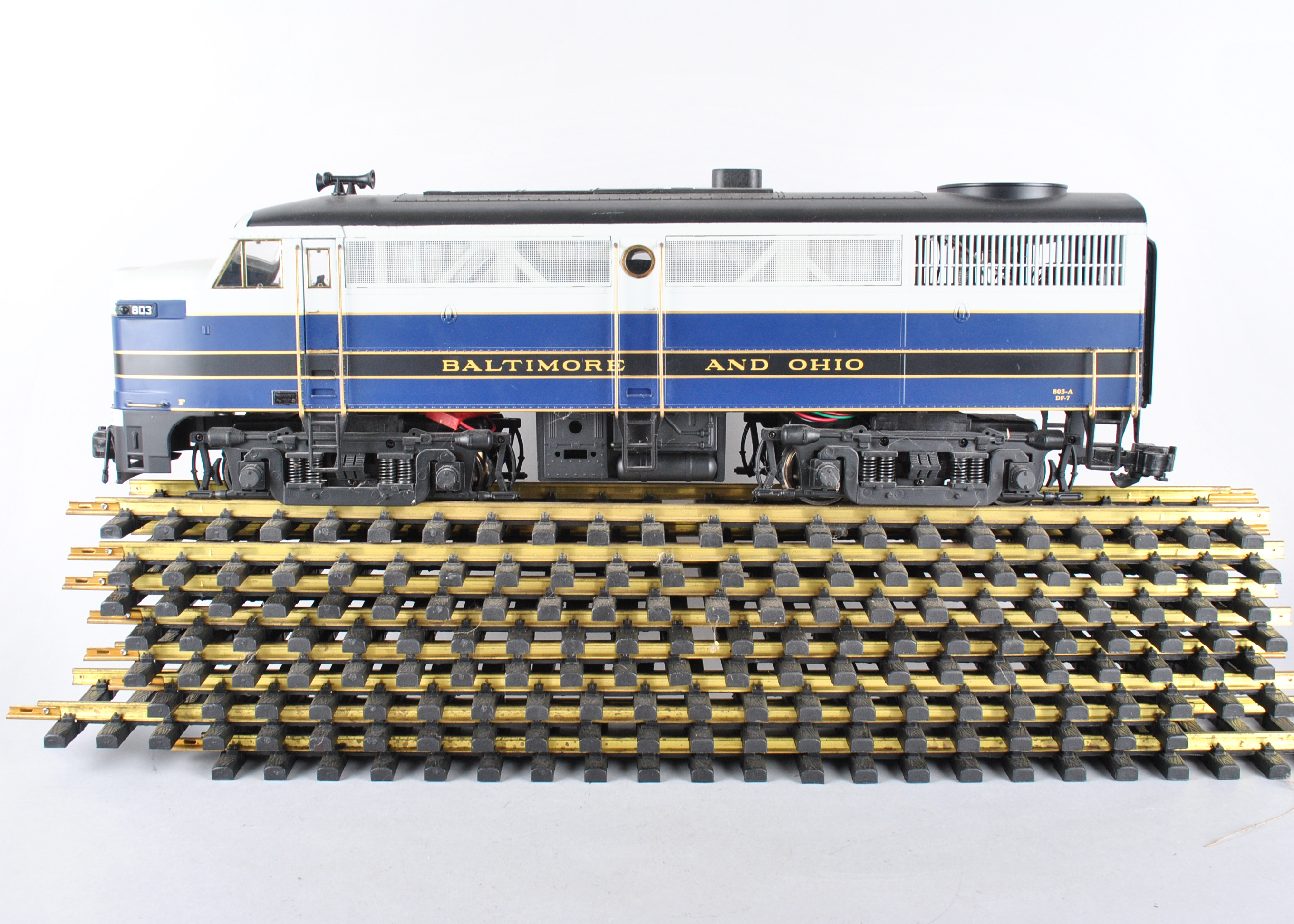 Assortment Of G-Scale Freight Cars, Tracks, And Accessories