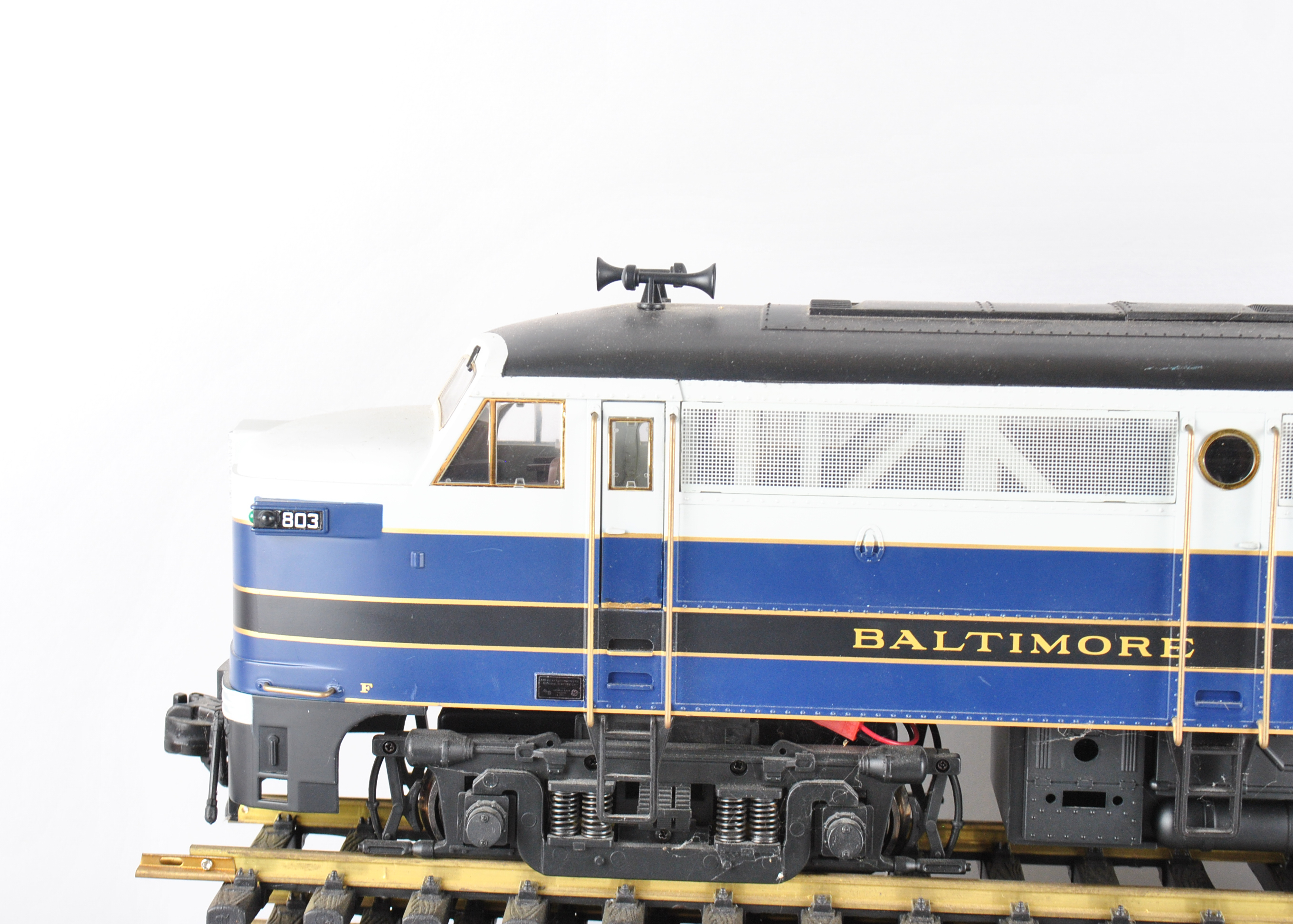 Assortment Of G-Scale Freight Cars, Tracks, And Accessories