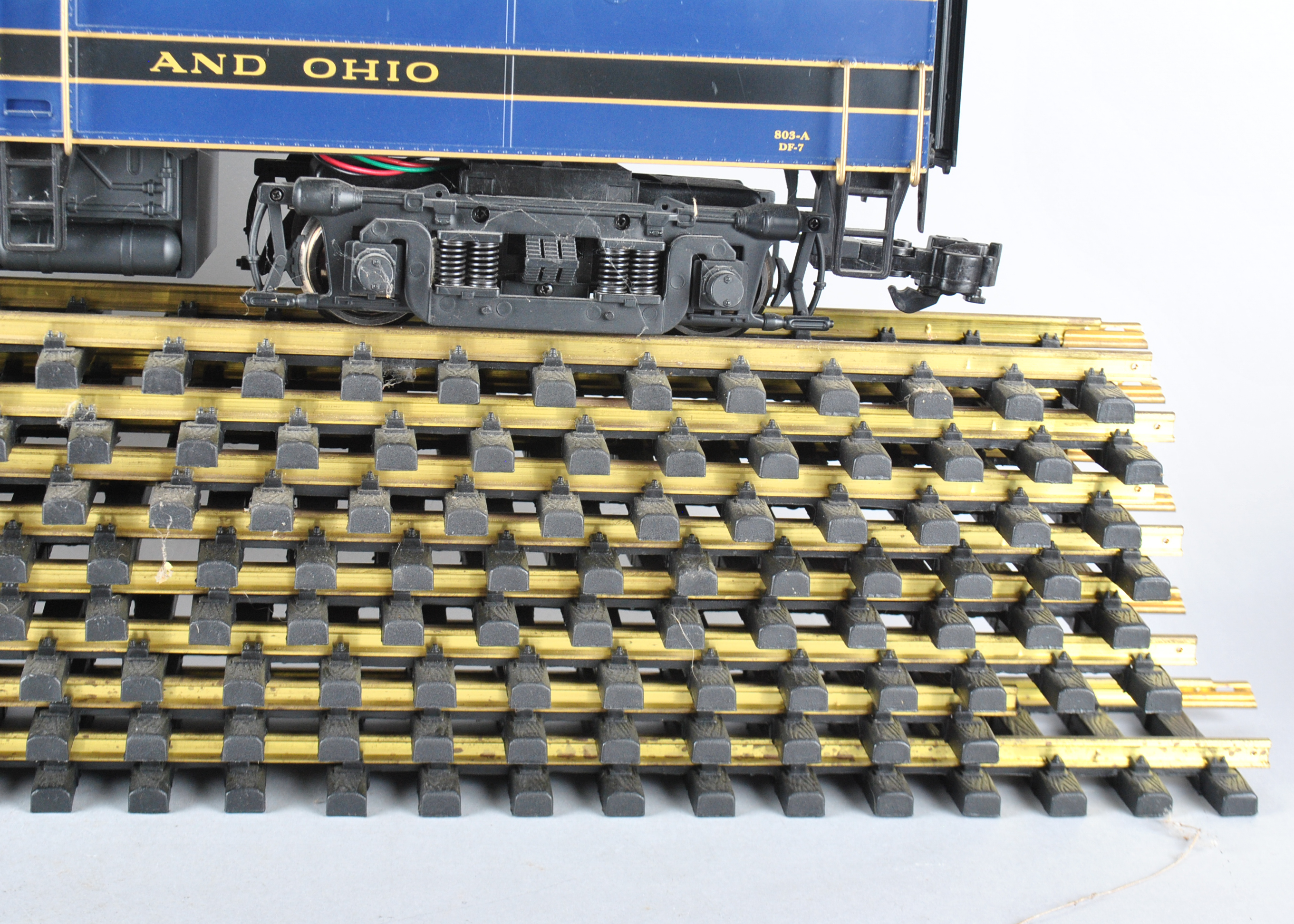 Assortment Of G-Scale Freight Cars, Tracks, And Accessories