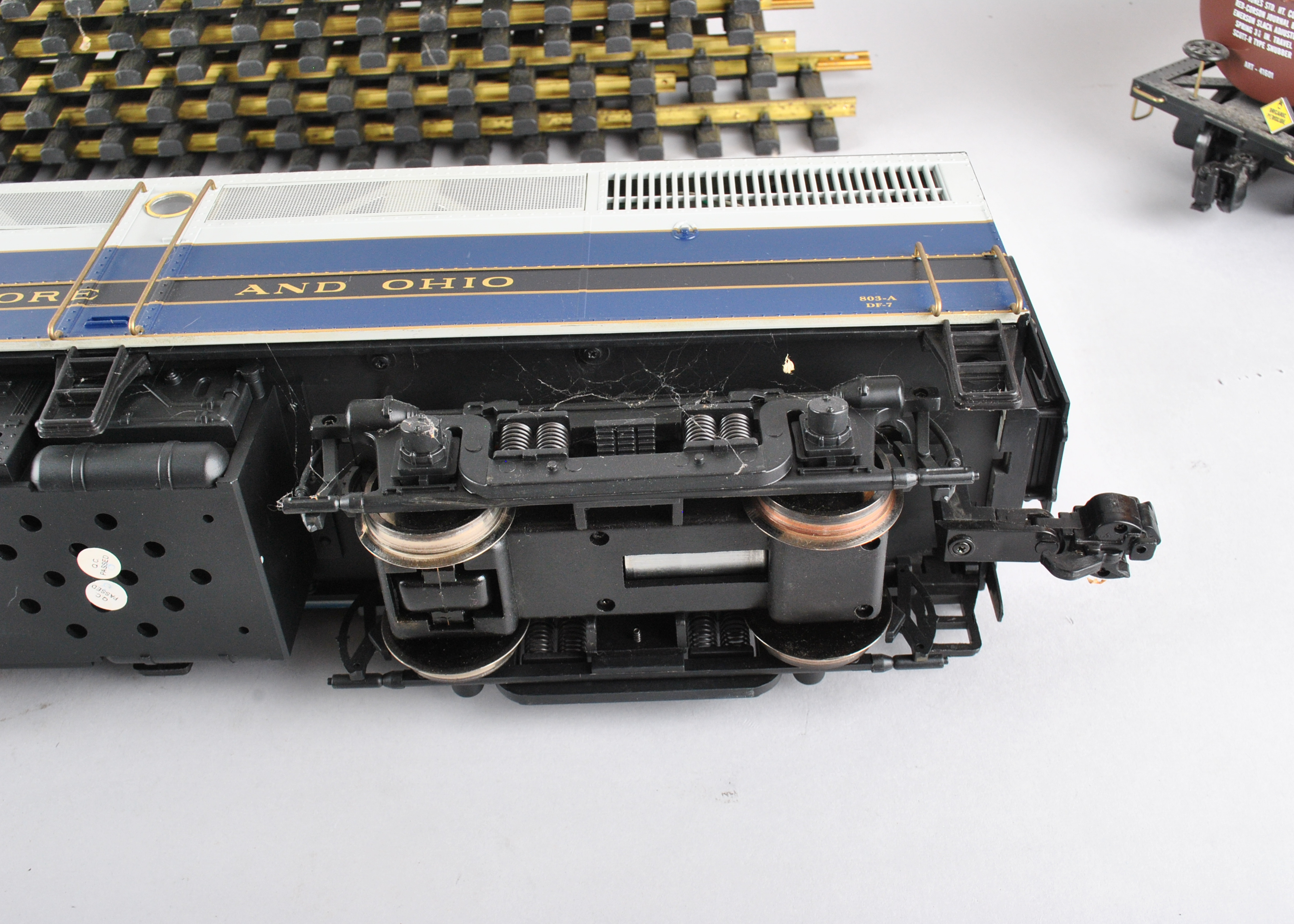 Assortment Of G-Scale Freight Cars, Tracks, And Accessories