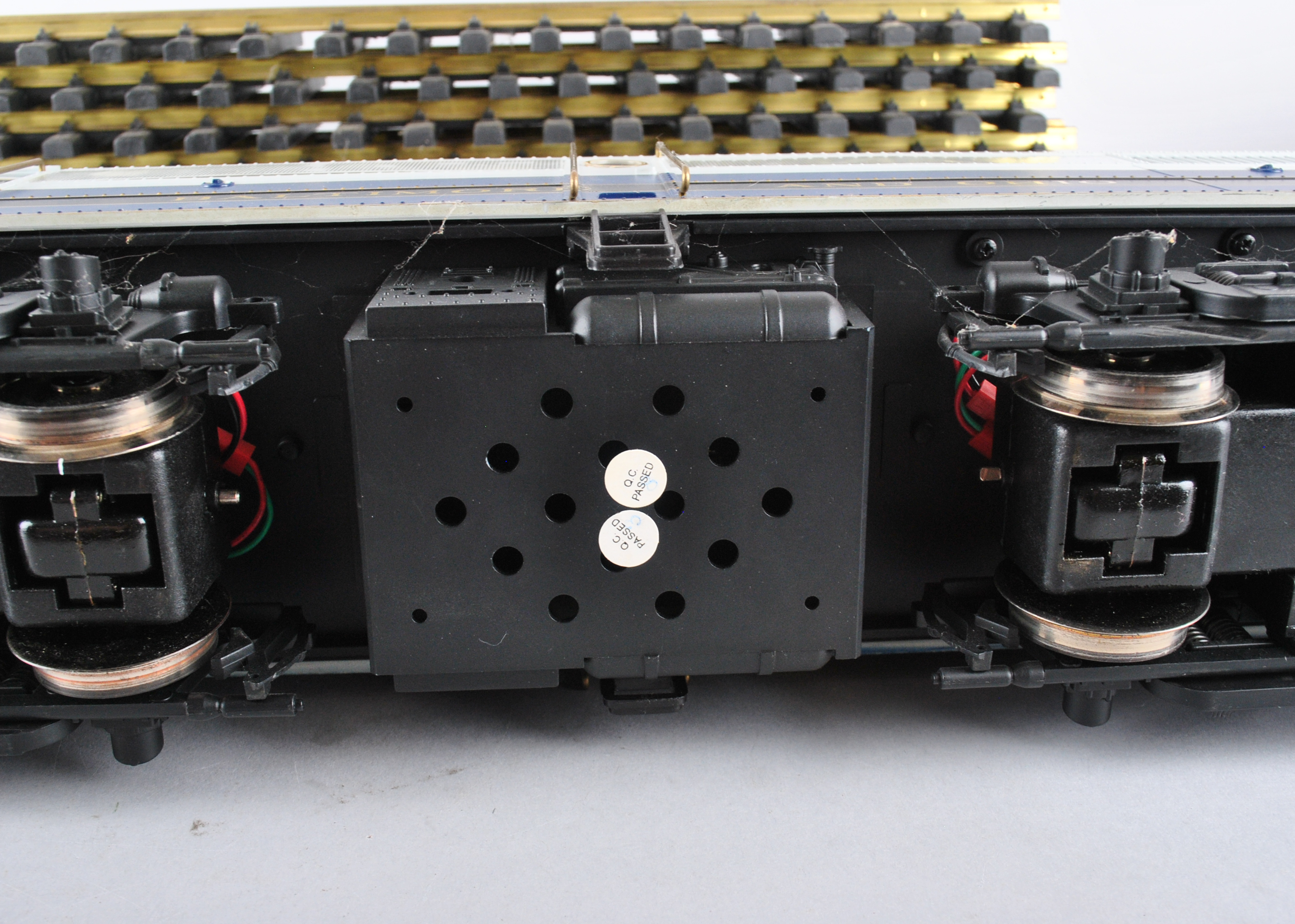 Assortment Of G-Scale Freight Cars, Tracks, And Accessories