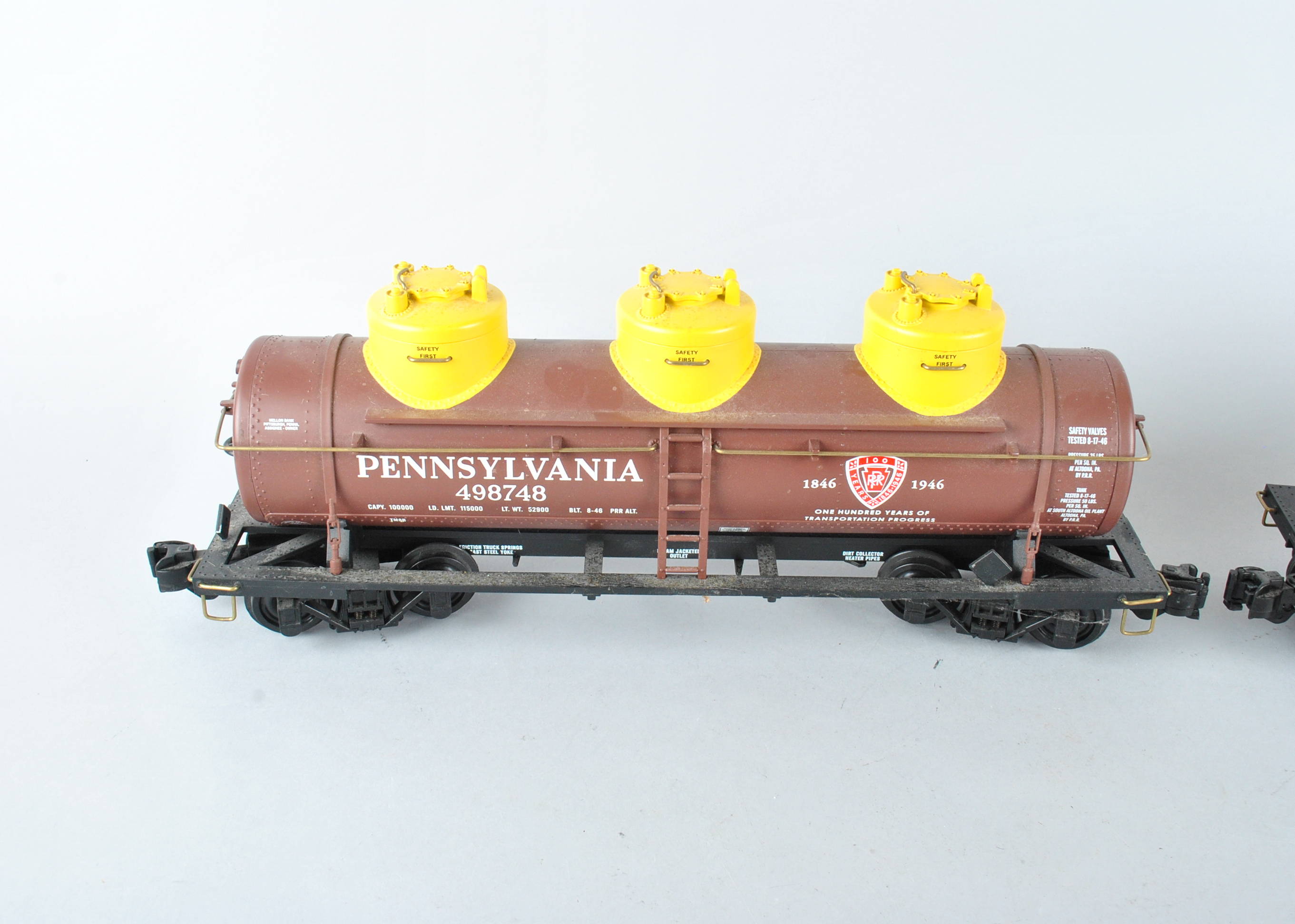 Assortment Of G-Scale Freight Cars, Tracks, And Accessories