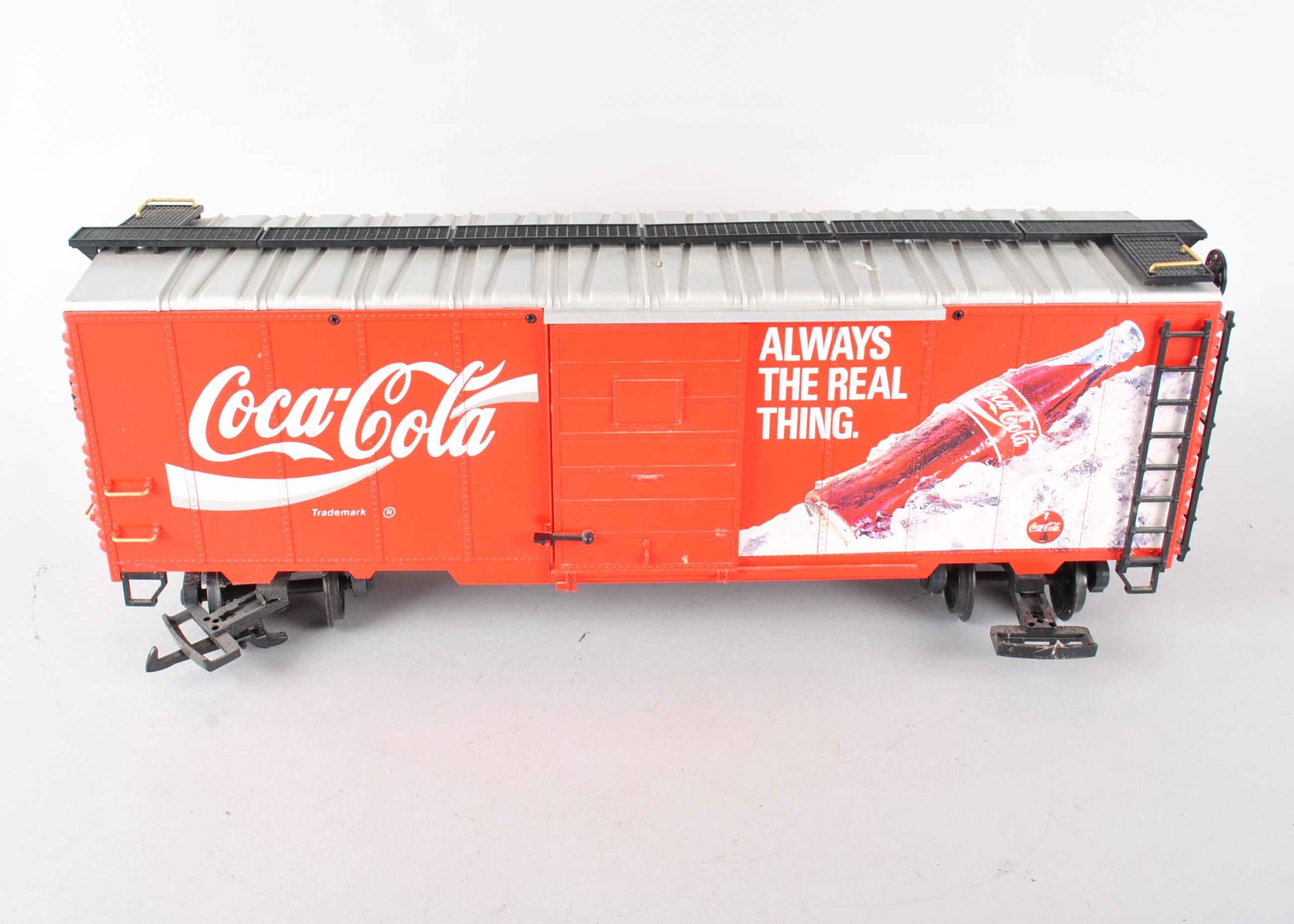 Assortment Of G-Scale Freight Cars, Tracks, And Accessories