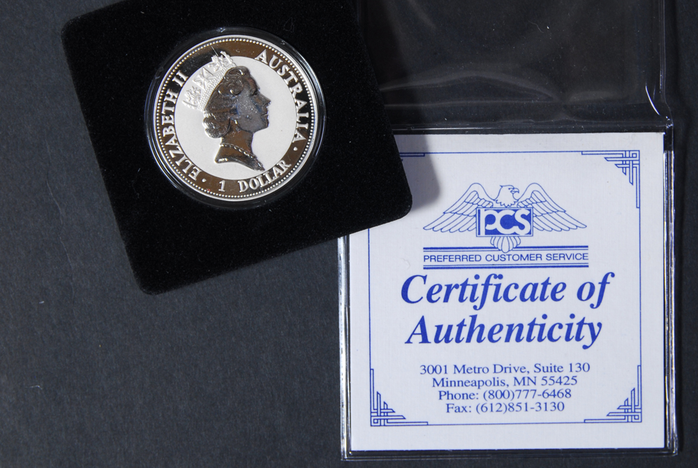 Collection of Four International Silver Coins