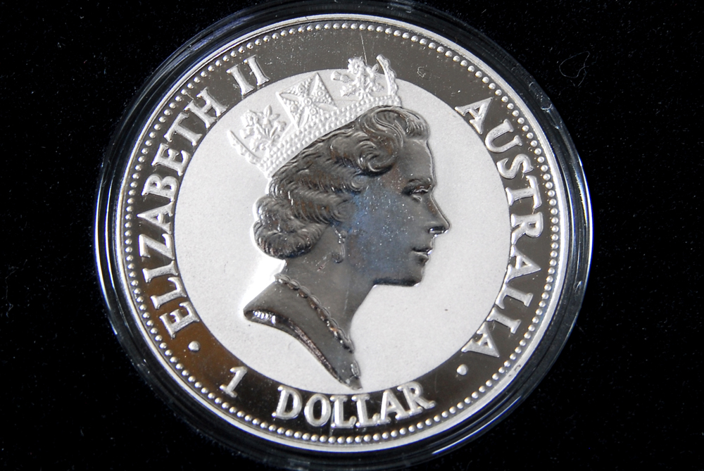 Collection of Four International Silver Coins