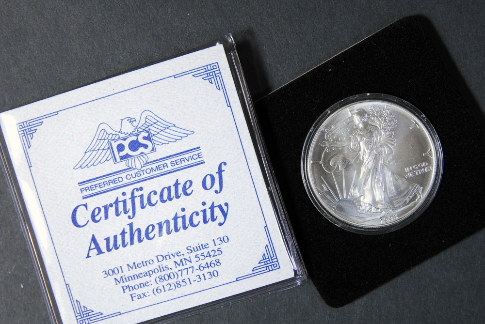 Collection of Four International Silver Coins