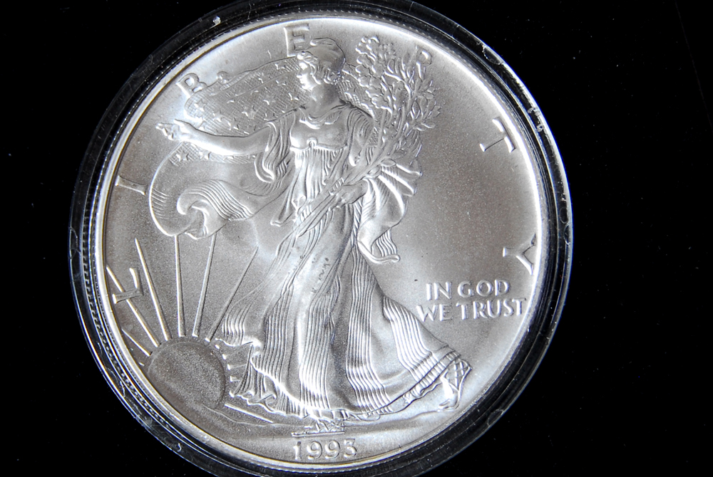 Collection of Four International Silver Coins