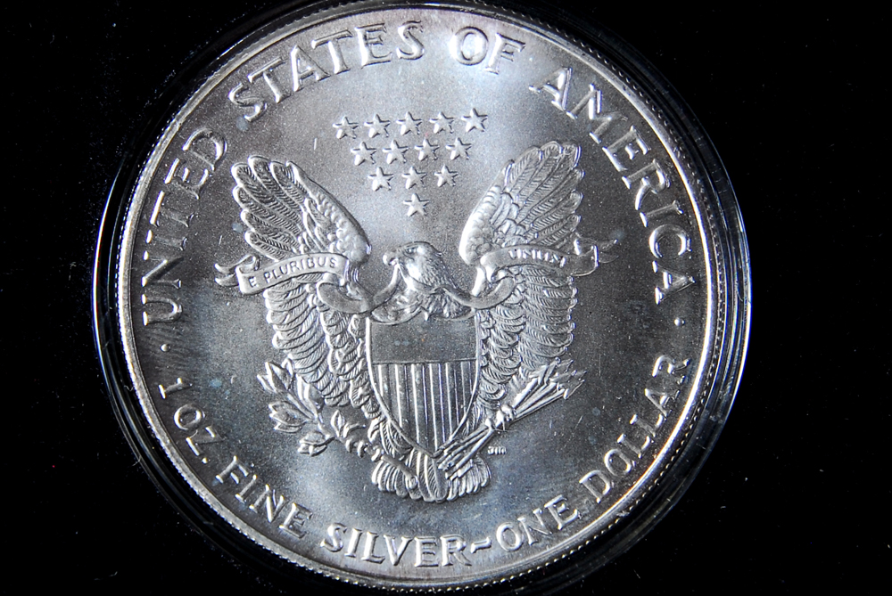 Collection of Four International Silver Coins