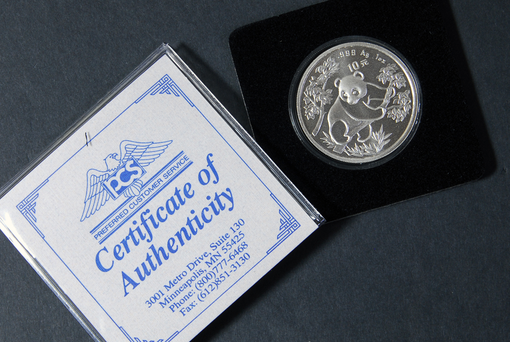 Collection of Four International Silver Coins