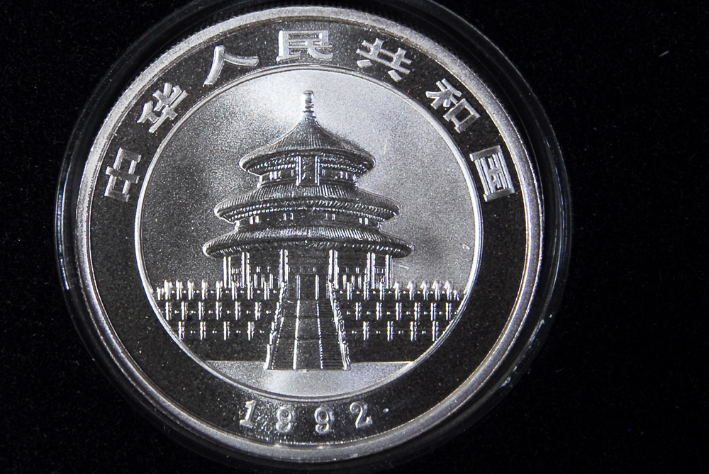 Collection of Four International Silver Coins