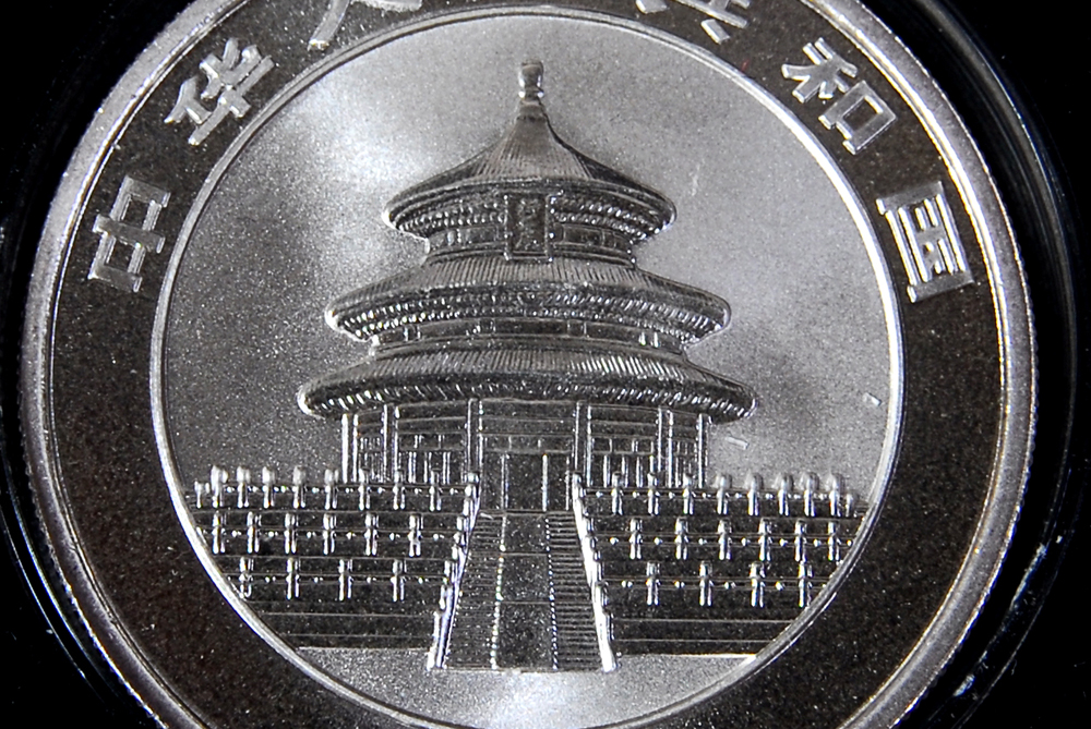 Collection of Four International Silver Coins