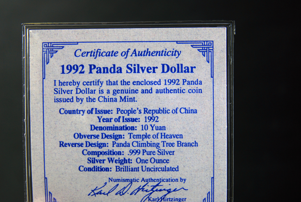 Collection of Four International Silver Coins