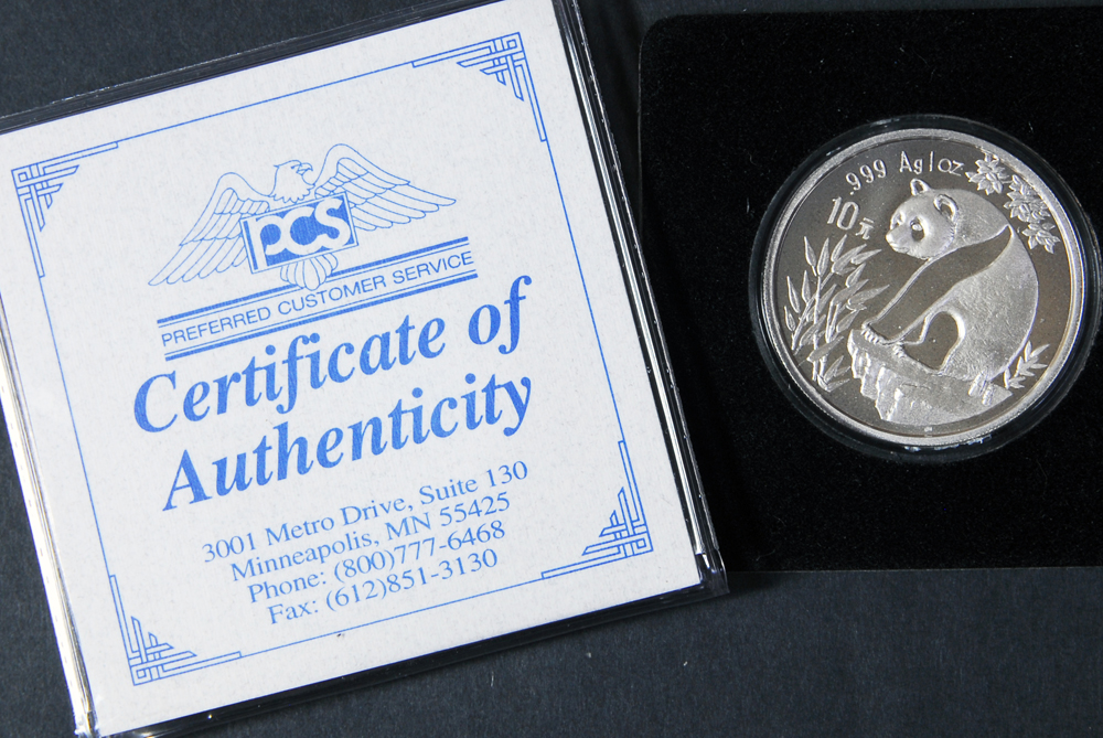 Collection of Four International Silver Coins